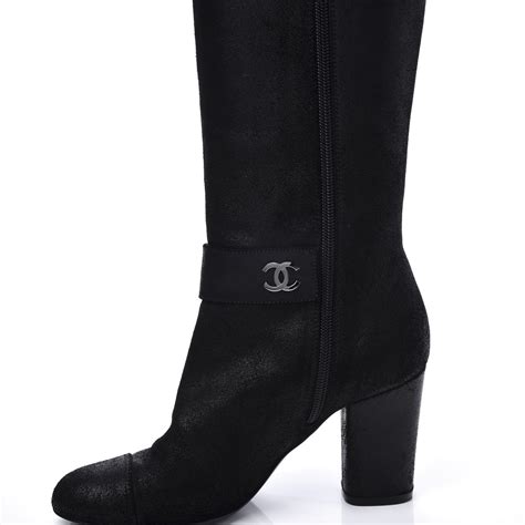 chanel knee high flat boots|Chanel ankle boots with chain.